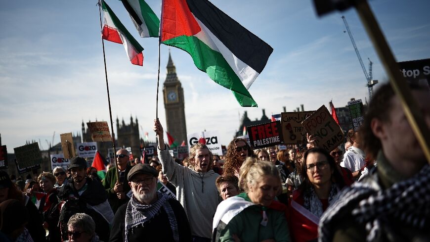 The colours of the Palestinian flag fringed the embankment of the River Thames in central London