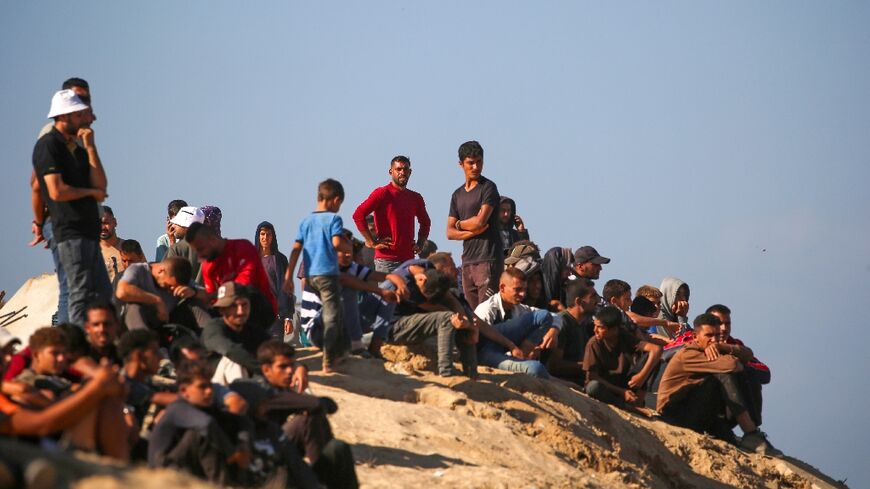Displaced Palestinian civilians were at first nervous to return to their homes as Israeli forces beagn a ceasefire, but a trickle soon turned into a flood of people heading north to Gaza City