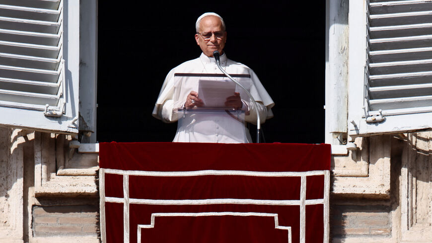 Pope Leo XIV leads the Angelus prayer from the window of the Apostolic Palace at the Vatican, November 2, 2025. REUTERS/Vincenzo Livieri