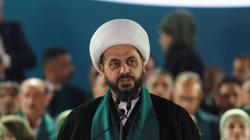 Qais al-Khazali, head of the Asaib Ahl al-Haq group, speaks during a rally to present the Sadiqoon Movement ahead of parliamentary elections, in Baghdad, Iraq, October 10, 2025. REUTERS/Ahmed Saad