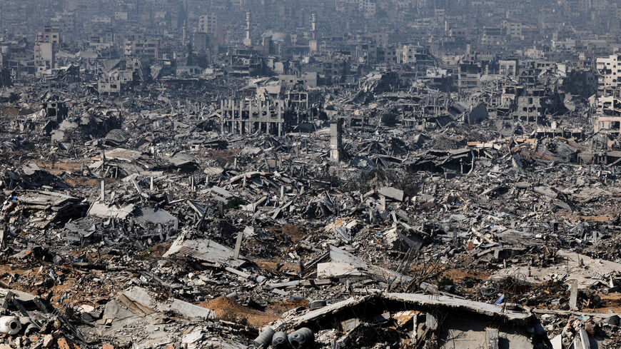 Destroyed buildings as seen from an Israeli military outpost within the borders of the 'yellow line' in the Shujaiya neighborhood in the eastern part of Gaza City, in the Gaza Strip, November 5. REUTERS/Nir Elias