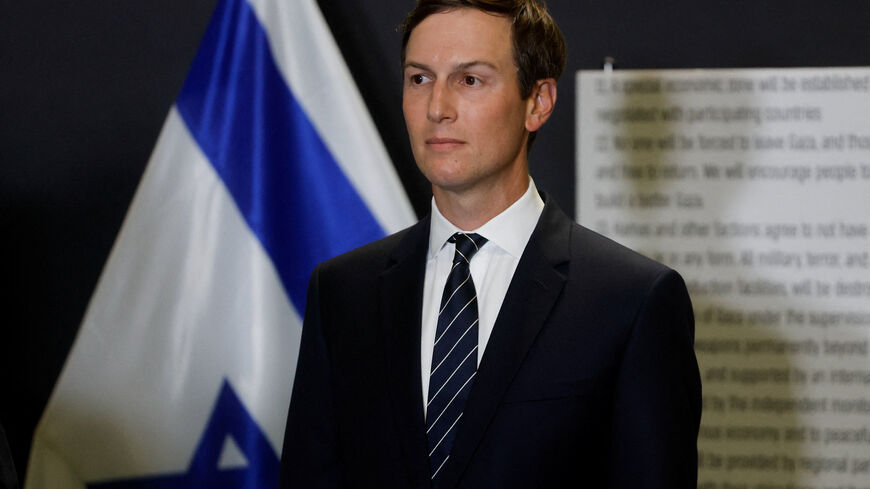 Jared Kushner listens as U.S. Vice President JD Vance (not pictured) speaks to members of the media in Kiryat Gat, Israel, October 21, 2025. REUTERS/Ammar Awad