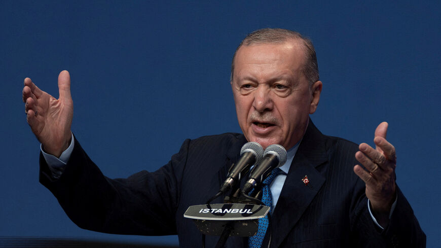 FILE PHOTO: Turkish President Tayyip Erdogan addresses his supporters during a meeting in Istanbul, Turkey, September 13, 2025. REUTERS/Umit Bektas/File Photo