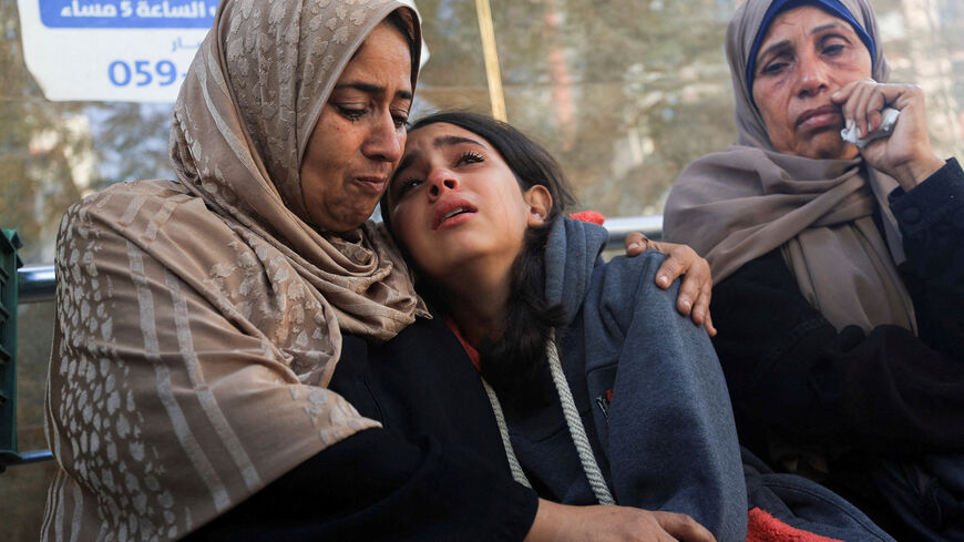 Mourners react as they attend the funeral of Palestinians who, according to medics, were killed in overnight Israeli strikes, at Al-Shifa Hospital in Gaza City, November 20, 2025. REUTERS/Dawoud Abu Alkas     TPX IMAGES OF THE DAY