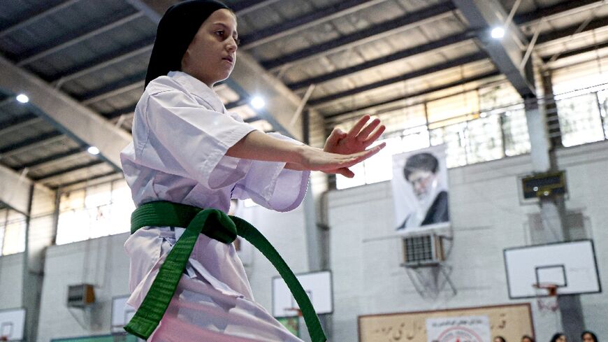 Iranian women are increasingly taking part in martial arts like karate amid tentative steps towards having greater public roles  