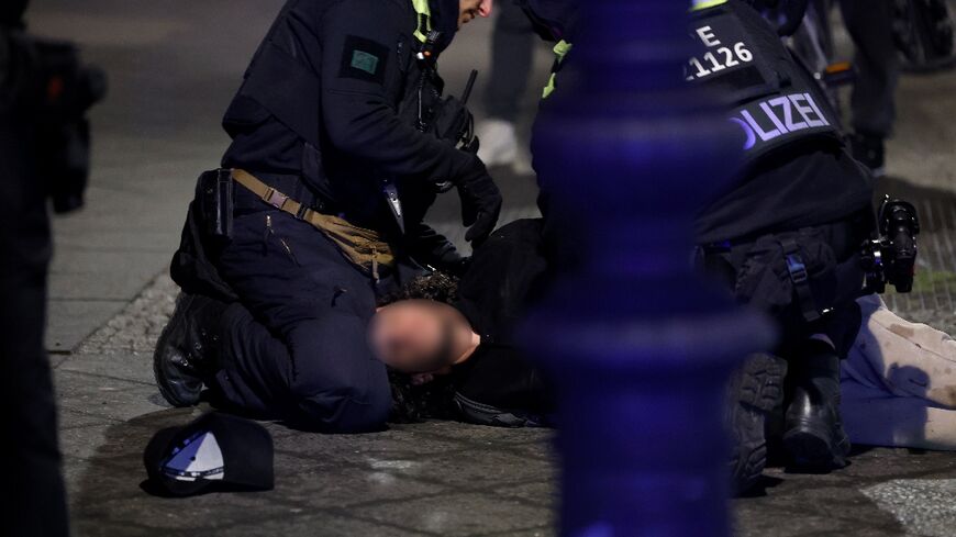 Police apprehended the suspect after the stabbing near the Memorial to the Murdered Jews of Europe in Berlin on February 21, 2025