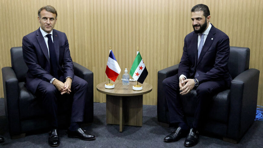 France's President Emmanuel Macron and Syria's President Ahmed al-Sharaa look on during a bilateral meeting within the framework of the COP30 UN climate conference in Belem, Brazil, Nov. 6, 2025.