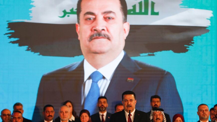 Iraq's Prime Minister Mohammed Shia al-Sudani delivers a speech during a campaign rally in Baghdad for the Reconstruction and Development Coalition ahead of the country's parliamentary elections