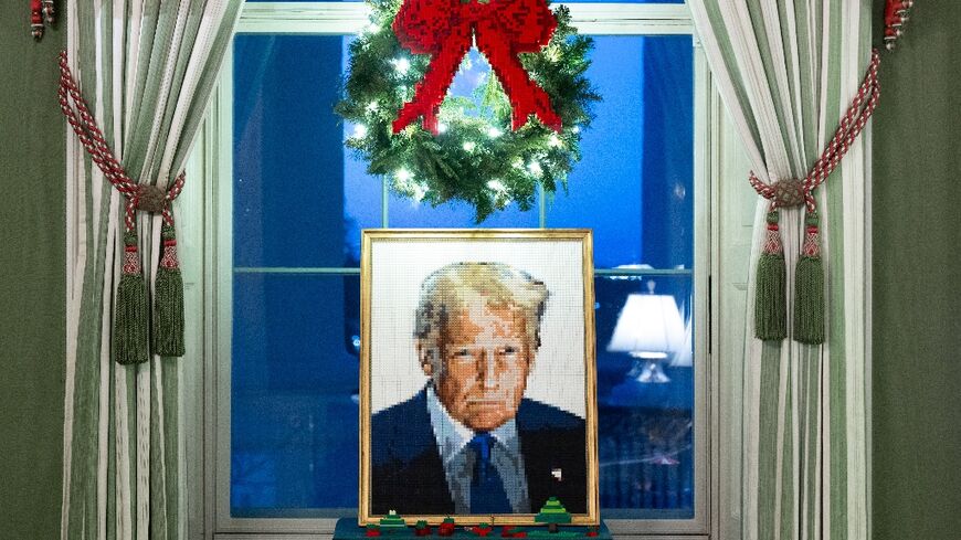 A portrait of US President Donald Trump made out of Legos is seen as part of Christmas decorations at the White House