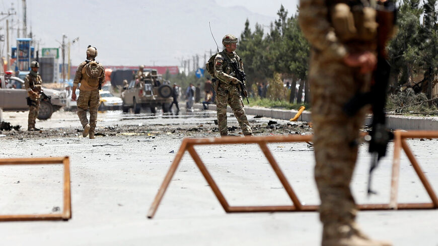 Afghan security forces and a British soldier in Kabul, Afghanistan May 31, 2019. REUTERS/Omar Sobhani/File Photo