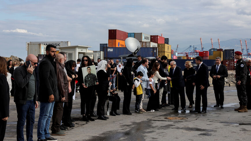 Lebanese Prime Minister Nawaf Salam meets with relatives of victims of the Beirut port blast, at Beirut port, Lebanon December 2, 2025. REUTERS/Emilie Madi