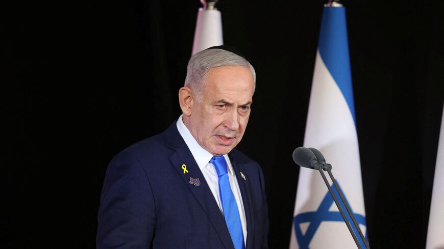 Israeli Prime Minister Benjamin Netanyahu participates in the state memorial ceremony for the fallen of the Iron Swords War on Mount Herzl, in Jerusalem, 16 October 2025.    Alex Kolomoisky/Pool via REUTERS