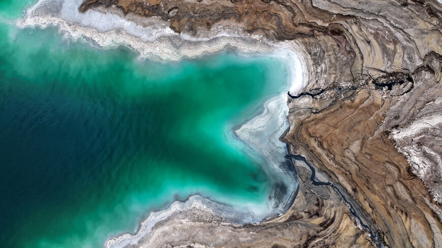 FILE PHOTO: A drone picture shows part of the Dead Sea and its shore near Ein Gedi, Israel, February 7, 2025.  REUTERS/Ilan Rosenberg/File Photo