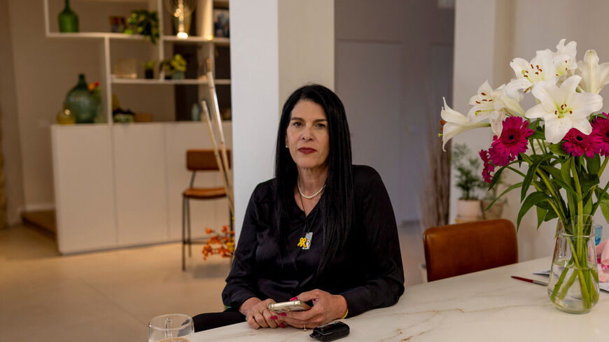 Talik Gvili, the mother of Ran Gvili, the last hostage remaining in Gaza following the deadly October 7, 2023 attack by Hamas, looks on during an interview with Reuters at her home in Meitar, Israel December 7, 2025. According to his mother, Ran Gvili, who served in an elite Israeli police unit, was injured fighting during the attack and later confirmed dead. REUTERS/Ronen Zvulun