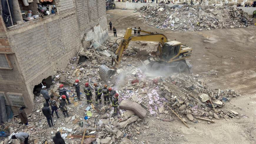 Rescuers work at the site of the collapse of two buildings in Fes, Morocco, December 10, 2025. REUTERS/Said Echarif