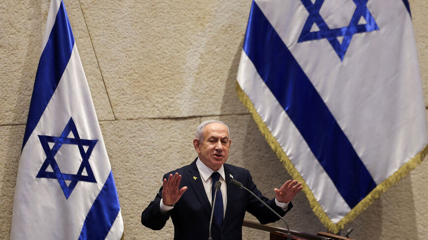 FILE PHOTO: Israeli Prime Minister Benjamin Netanyahu speaks at the plenum of the Knesset, Israel's parliament, in Jerusalem, November 10, 2025. REUTERS/Ronen Zvulun/File Photo