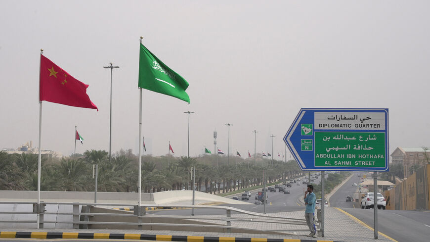 Flags of China and Saudi Arabia are seen in this picture, in Riyadh, Saudi Arabia, December 7, 2022. REUTERS/Mohammed Benmansour