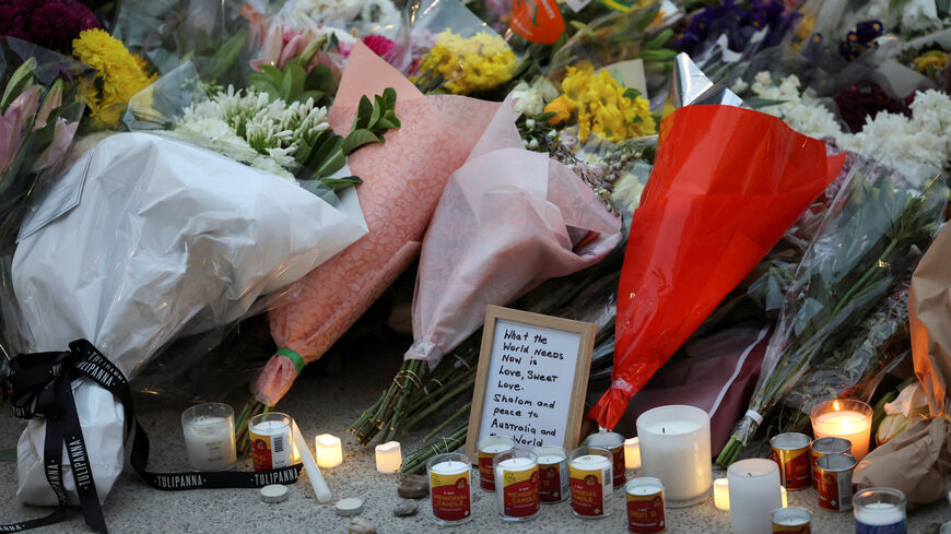 Floral tributes are laid at Bondi Pavilion to pay respect to the victims of a shooting during a Jewish holiday celebration at Bondi Beach, in Sydney, Australia, December 15, 2025. REUTERS/Hollie Adams