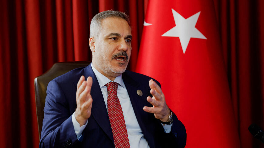 Turkish Foreign Minister Hakan Fidan speaks during an interview with Reuters at the 23rd edition of the annual Doha Forum, in Doha, Qatar, December 6, 2025. REUTERS/Ibraheem Abu Mustafa