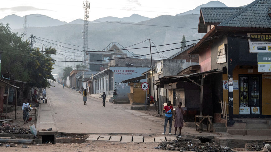 FILE PHOTO: Congolese civilians walk after returning to their homes following displacement during renewed clashes between Alliance Fleuve Congo AFC/M23 and the Armed Forces of the Democratic Republic of the Congo (FARDC), in Uvira town, South Kivu province, in the Democratic Republic of Congo December 13, 2025. REUTERS/Stringer/File Photo