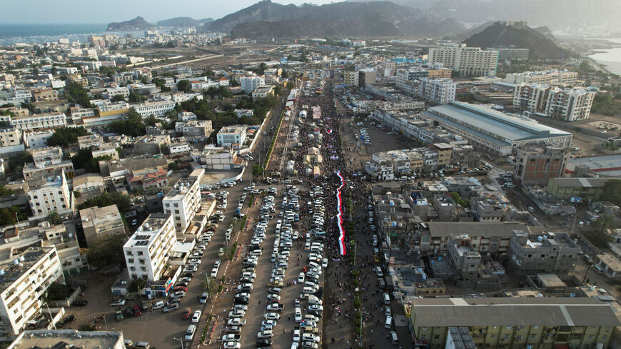 A drone view shows people attending a rally organised by Yemen's main separatist group, the Southern Transitional Council (STC), in Aden, Yemen December 21, 2025. REUTERS/Fawaz Salman