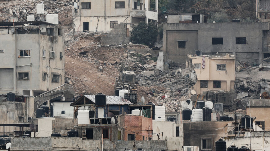 Buildings lie in ruins during an Israeli army operation in Jenin, in the Israeli-occupied West Bank, February 3, 2025. REUTERS/Raneen Sawafta