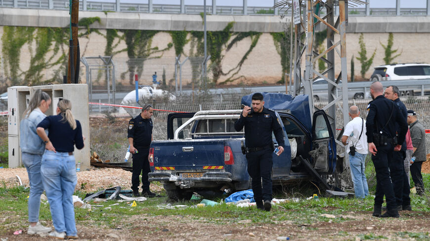 Israeli security forces inspect the scene where a vehicle was used by assailant in a suspected ramming and stabbing attack that killed two people in northern Israel according to Israeli authorities, in Afula, Israel December 26, 2025. REUTERS/Gil Eliyahu