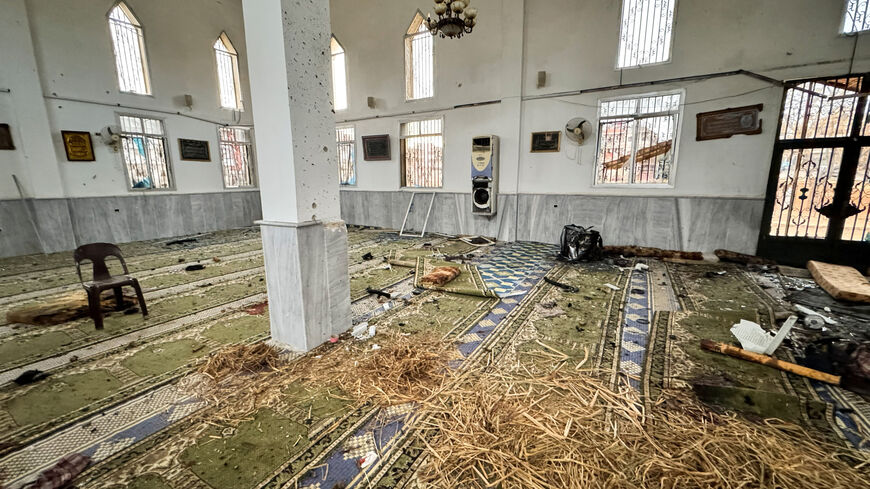 A view shows an interior of a damaged mosque after several people were killed in an explosion at a mosque of the Alawite minority sect, as a Syrian Arab News Agency (SANA) said, in Homs, Syria December 26, 2025. REUTERS/Ali Ahmed al-Najjar