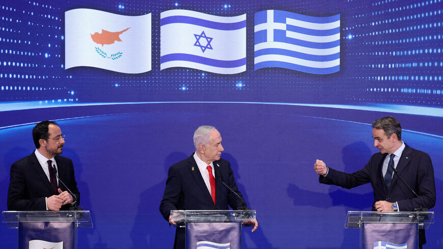 FILE PHOTO: Israeli Prime Minister Benjamin Netanyahu (centre), Cyprus President Nikos Christodoulides (left) and Greek Prime Minister Kyriakos Mitsotakis hold a joint press conference after a trilateral meeting at the Citadel of David Hotel in Jerusalem, 22 December 2025.    ABIR SULTAN/Pool via REUTERS/File Photo