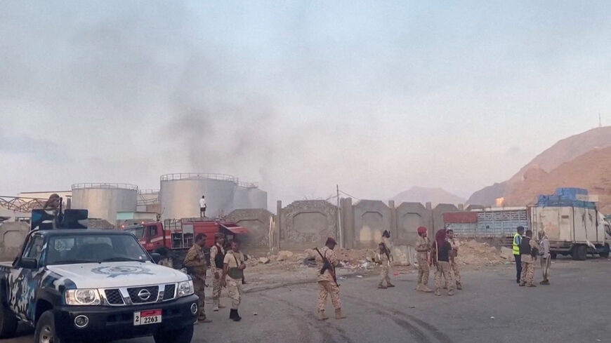 Smoke rises in the aftermath of a Saudi-led coalition airstrike, which targeted what it described as foreign military support to UAE-backed southern separatists, in Yemen's southern port of Mukalla. SABAA TV via REUTERS