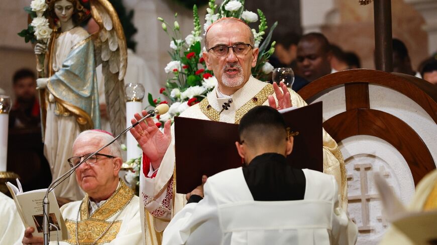 Acting Latin Patriarch of Jerusalem Pierbattista Pizzaballa led a Christmas Midnight Mass at the Church of the Nativity in Bethlehem as the Palestinian city celebrated its first festive Christmas in more than two years