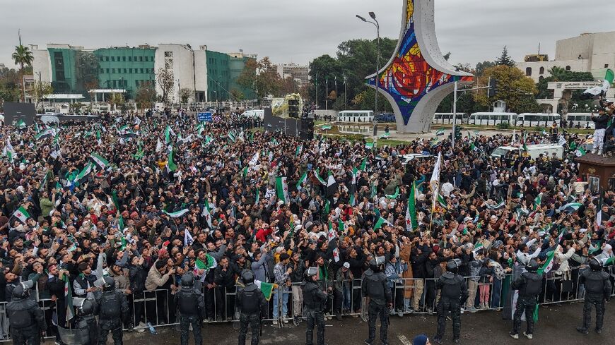 Tens of thousands celebrated a year since the toppling of longtime ruler Bashar al-Assad in Syria