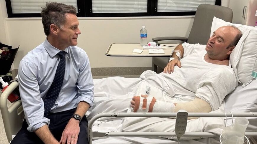 New South Wales Premier Chris Minns meets with Ahmed al-Ahmed in the hospital on Dec. 15, 2025.