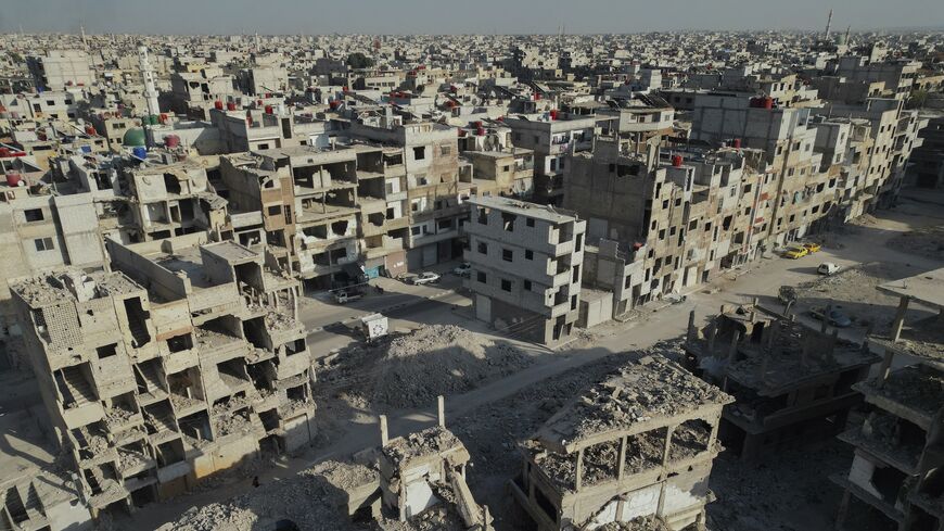 An aerial view shows the destruction across Yarmouk camp, Damascus, Syria, on Nov. 8, 2025.