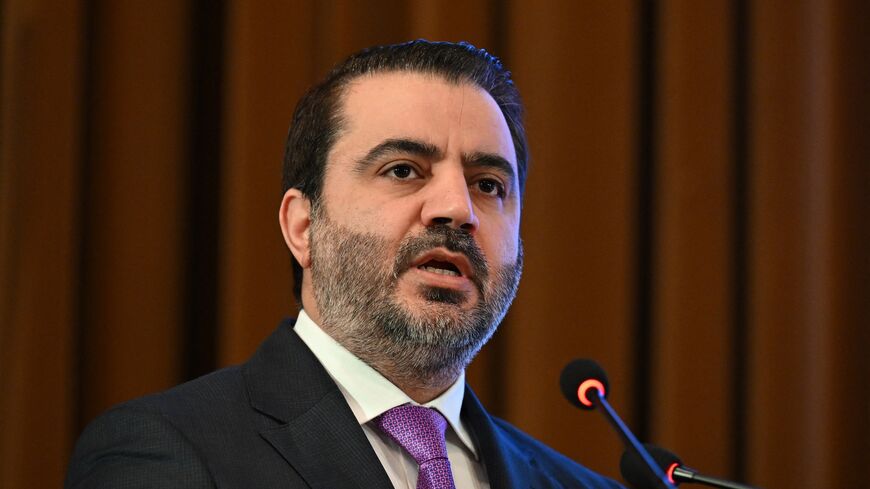 Syrian Foreign Minister Asaad Al-Shibani addresses delegates during a day of dialogue with Syrian civil society on Nov. 15, 2025.