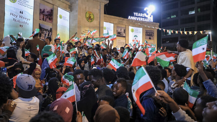 Residents wave Somaliland flags as they gather to celebrate Israel's announcement recognizing Somaliland's statehood in downtown Hargeisa, on Dec. 26, 2025. 