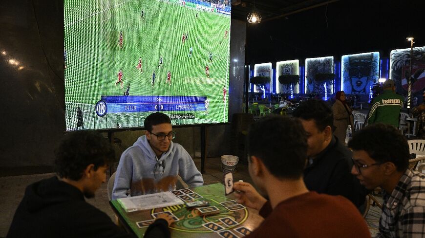 Cafegoers in Cairo would rather play cards than watch Liverpool without Mohamed Salah