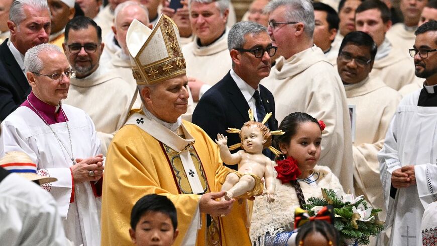 Pope Leo XIV held Christmas mass and was set to give the first "Urbi et Orbi" blessing on the balcony of St Peter's basilica

