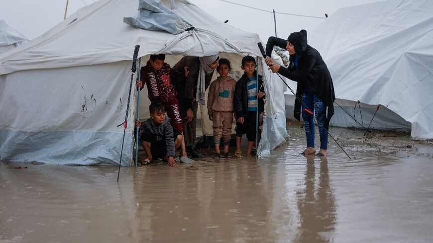 Storm Byron's heavy winter rains swept across Gaza, flooding tents and makeshift shelters