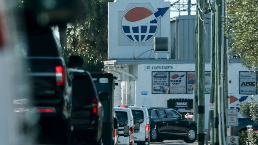 U.S. President Donald Trump arrives in his motorcade at an industrial park to purchase marble and onyx from Arc Stone and Tile for the White House ballroom, in Lake Worth, Florida, U.S., January 2, 2026. REUTERS/Jonathan Ernst