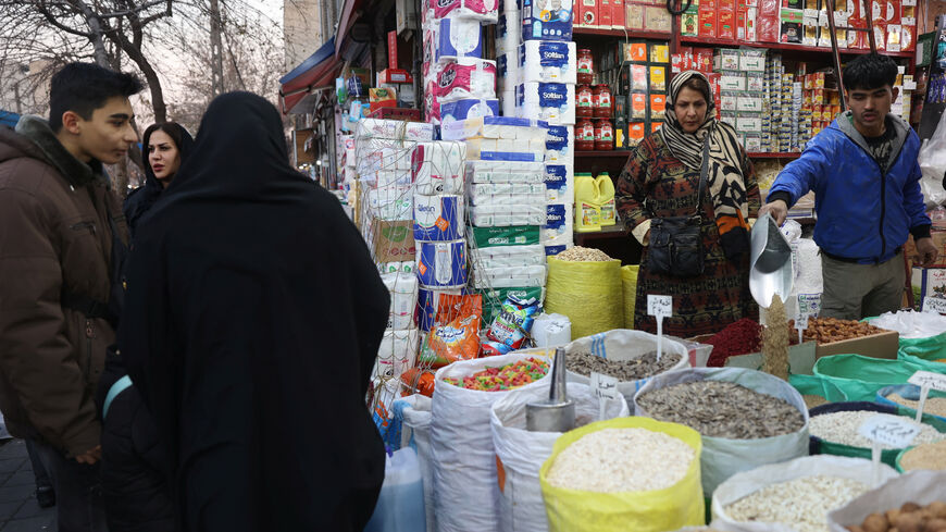 An Iranian woman shops in a local market in Tehran, Iran, January 5, 2026. Majid Asgaripour/WANA (West Asia News Agency) via REUTERS/File Photo