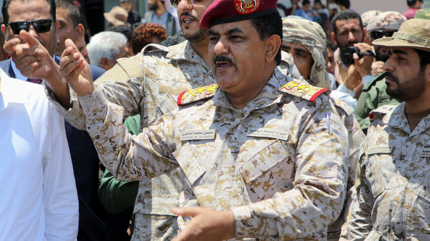 Minister of Defence of Yemen Mohsen Al-Daeri gestures as freed prisoners are greeted upon their arrival at Aden Airport, amid a prisoner swap between two sides in Yemen's conflict, in Aden, Yemen April 14, 2023. REUTERS/Fawaz Salman