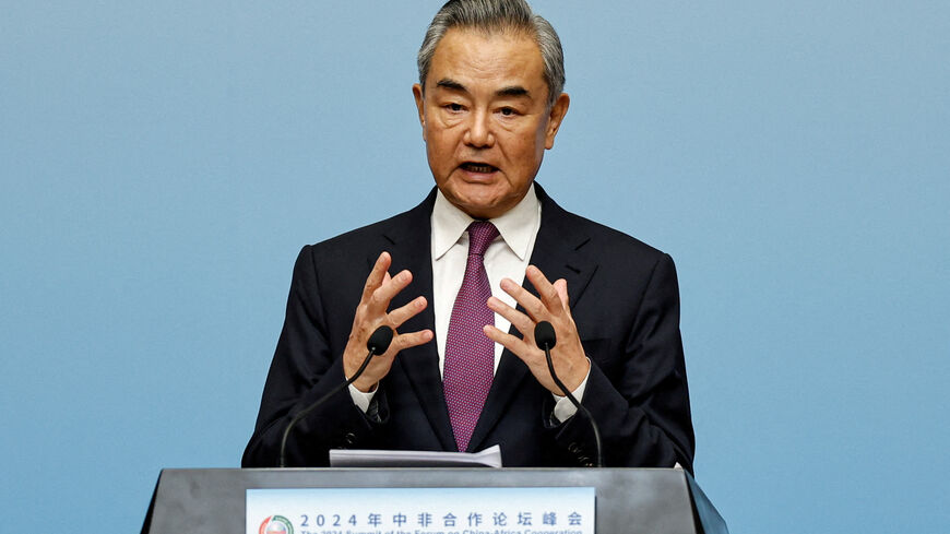 FILE PHOTO: China’s Foreign Minister Wang Yi speaks at a press conference during the 2024 Summit of the Forum on China-Africa Cooperation (FOCAC) in Beijing, China September 5, 2024. REUTERS/Tingshu Wang/File Photo