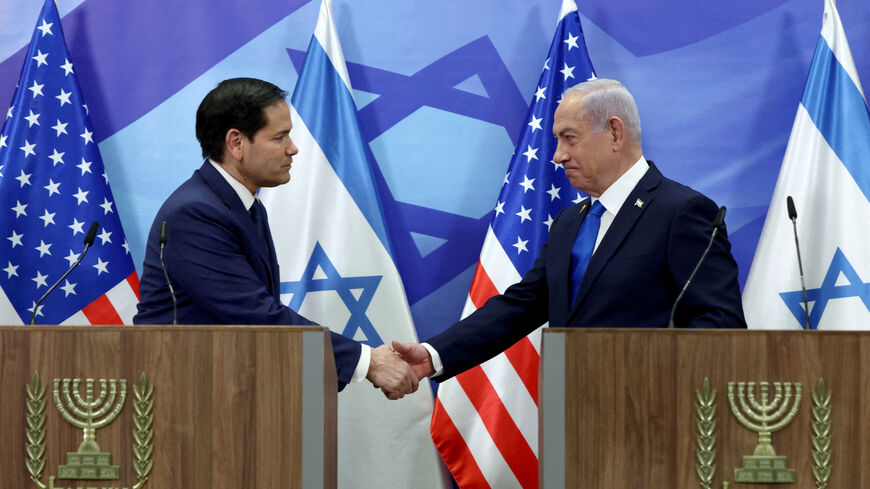 U.S. Secretary of State Marco Rubio and Israeli Prime Minister Benjamin Netanyahu shake hands as they make joint statements to the press at the Prime Minister's office in Jerusalem, February 16, 2025. Reuters/Evelyn Hockstein/Pool