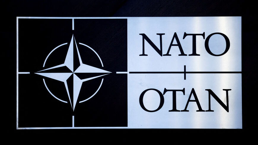 FILE PHOTO: The logo of NATO is seen at a meeting of the North Atlantic Council in the NATO defence ministers' session together with Sweden as the invitee, at the Alliance's headquarters in Brussels, Belgium February 15, 2024. REUTERS/Johanna Geron/File Photo