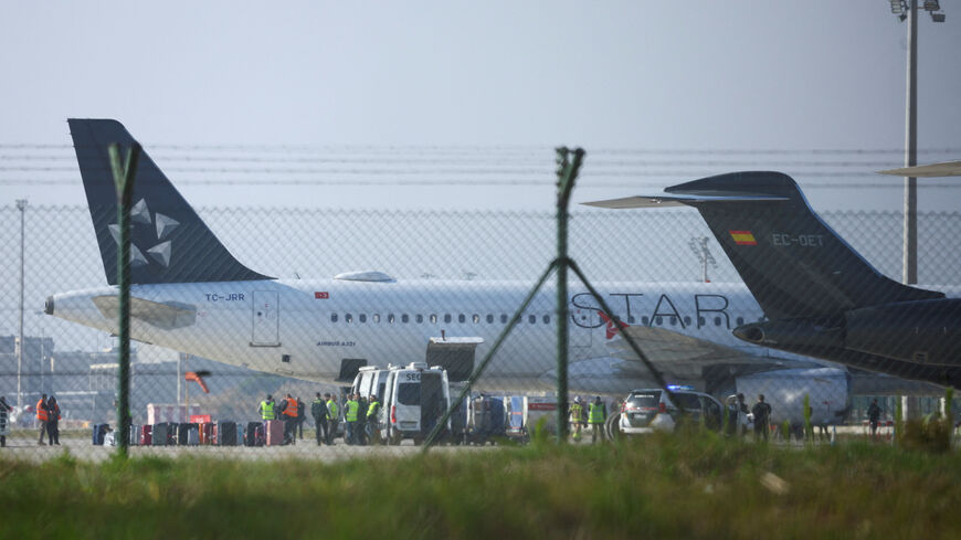 A Turkish Airlines plane is inspected by police after a false bomb threat following an emergency landing at Josep Tarradellas-El Prat Airport in Barcelona, Spain January 15, 2026. REUTERS/Albert Gea