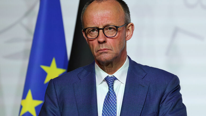 FILE PHOTO: Germany's Chancellor Friedrich Merz looks on as he delivers a press conference upon the signing of the declaration on deploying post-ceasefire force in Ukraine, during the so-called 'Coalition of the Willing' summit, at the Elysee Palace in Paris, France, January 6, 2026. Ludovic Marin/Pool via REUTERS/File Photo