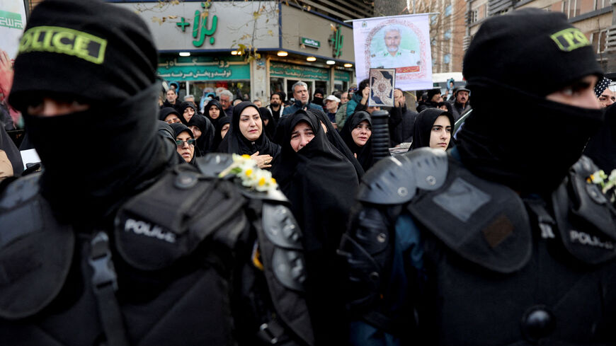 FILE PHOTO: People attend the funeral of the security forces who were killed in the protests that erupted over the collapse of the currency's value in Tehran, Iran, January 14, 2026. Majid Asgaripour/WANA (West Asia News Agency) via REUTERS/File Photo