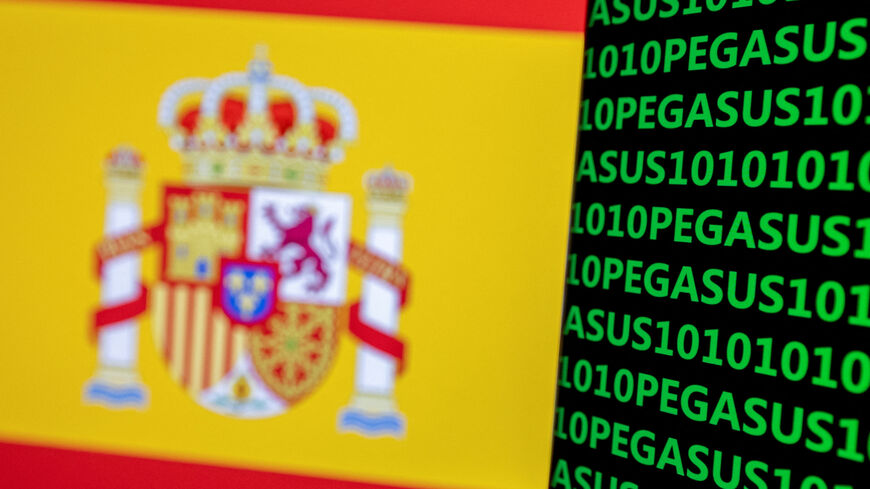 FILE PHOTO: The word Pegasus, binary code and the Spanish flag are seen in this illustration taken May 4, 2022. REUTERS/Dado Ruvic/Illustration/File Photo