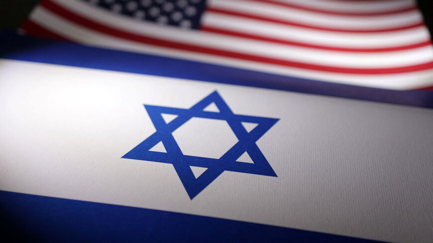 Israeli and U.S. flags are seen in this illustration taken, April 24, 2024. REUTERS/Dado Ruvic/Illustration